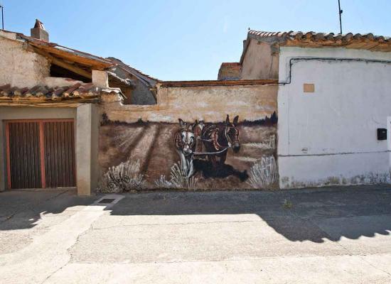 Vista de la obra el arado en fachada